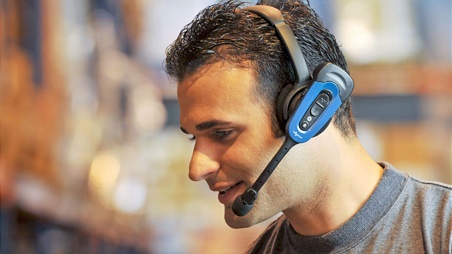 Man wearing Vocollect VoiceLink technology
