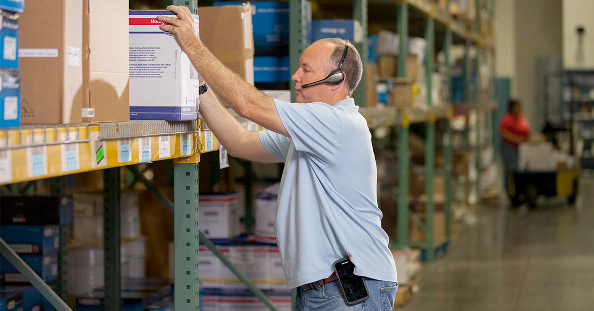Man using Android Voice Directed Warehousing Solutions
