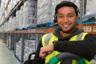 Happy voice picker in a warehouse